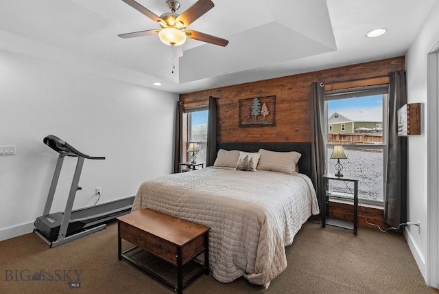 9 Blue Stem Way, Three Forks, MT 59752 - bedroom featuring carpet flooring, recessed lighting, baseboards, a ceiling fan, and a raised ceiling