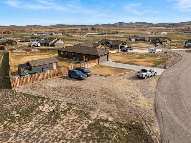 9 Blue Stem Way, Three Forks, MT 59752 - aerial perspective of suburban area with mountains