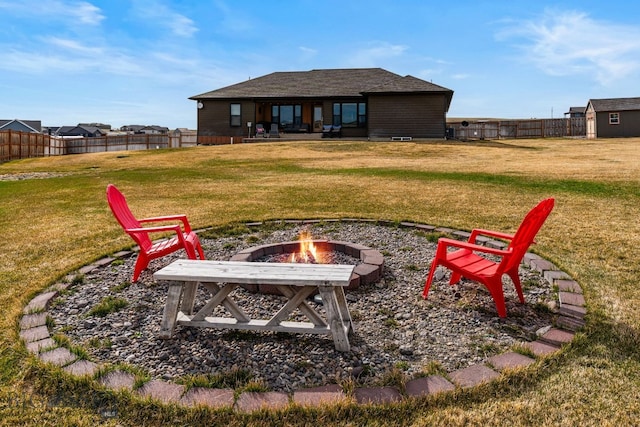 9 Blue Stem Way, Three Forks, MT 59752 - back of house with an outdoor fire pit