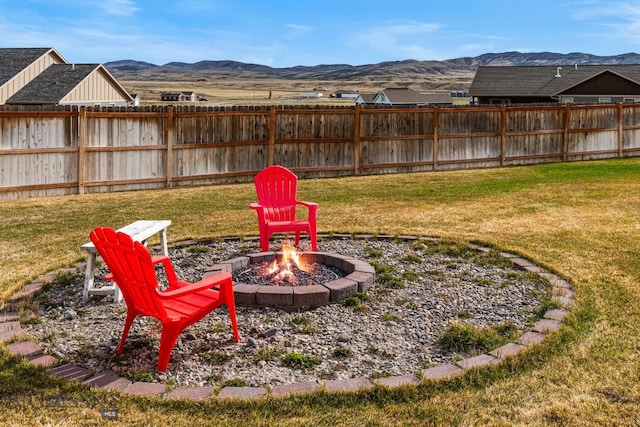 9 Blue Stem Way, Three Forks, MT 59752 - view of yard with a fire pit and a mountain view