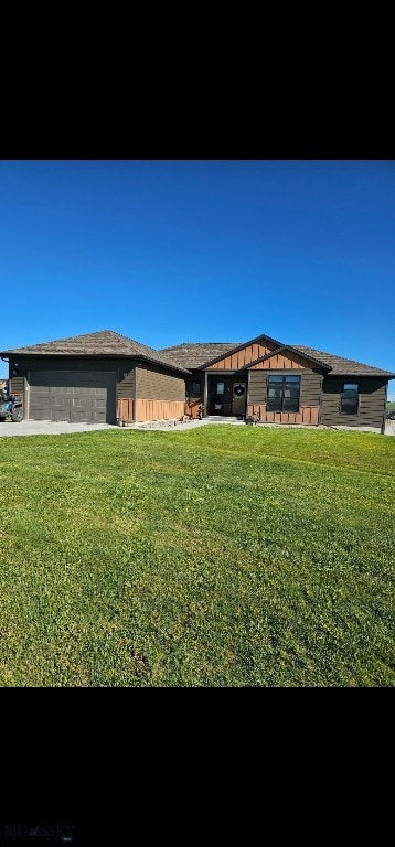 9 Blue Stem Way, Three Forks, MT 59752 - view of front of property featuring a front lawn and an attached garage