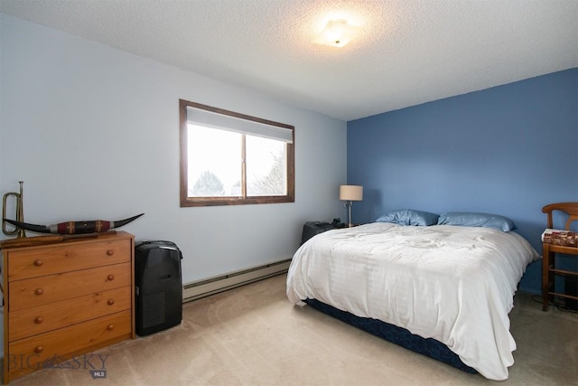bedroom with light colored carpet, a textured ceiling, and a baseboard radiator