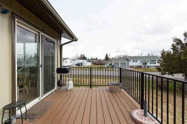 wooden deck with a residential view