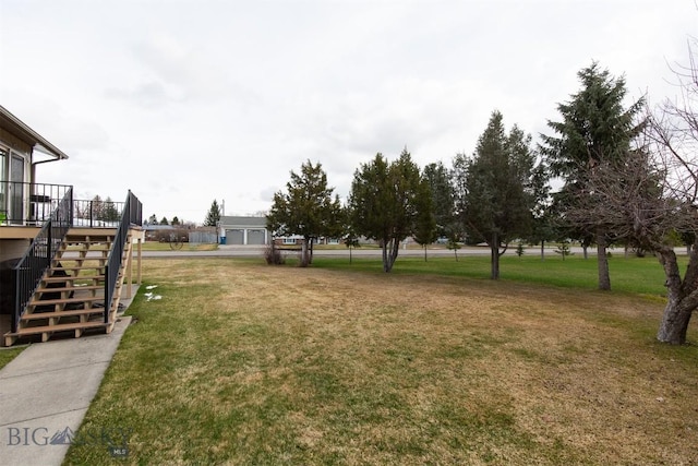 view of yard featuring stairway