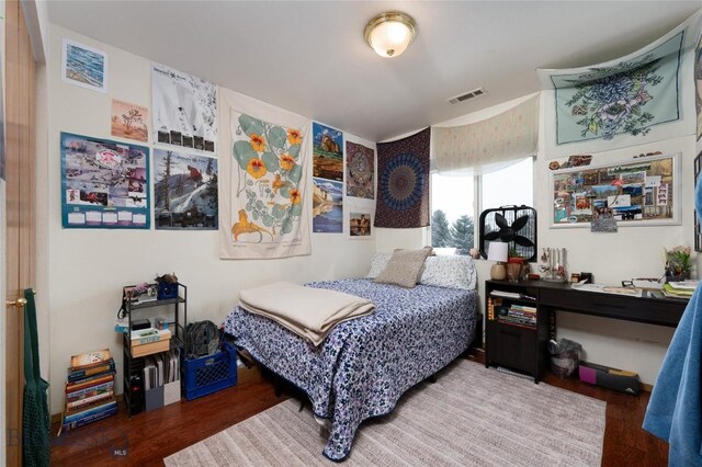 1719 W Kagy, Bozeman, MT 59715 - bedroom featuring visible vents and wood finished floors