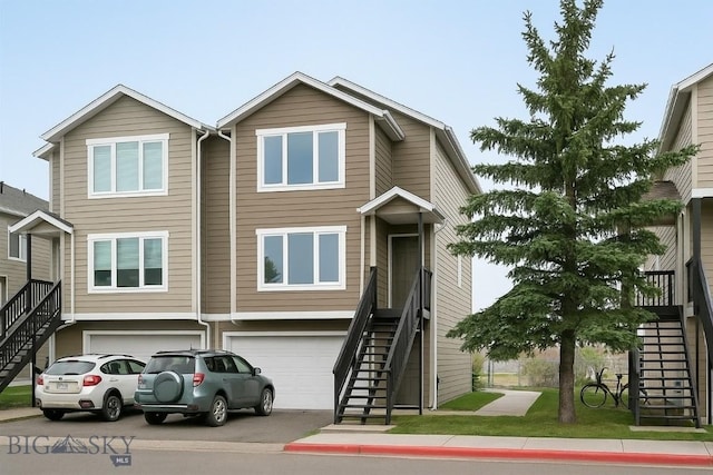 1719 W Kagy, Bozeman, MT 59715 - townhome / multi-family property with stairway and an attached garage