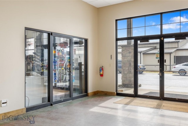 67 Village Dr Unit 4A, Belgrade, MT 59714 - entryway featuring concrete flooring and baseboards