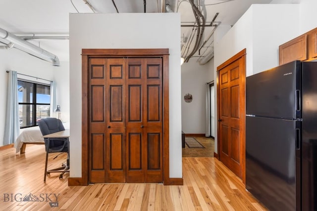 67 Village Dr Unit 4A, Belgrade, MT 59714 - entrance foyer featuring light wood-style flooring and baseboards