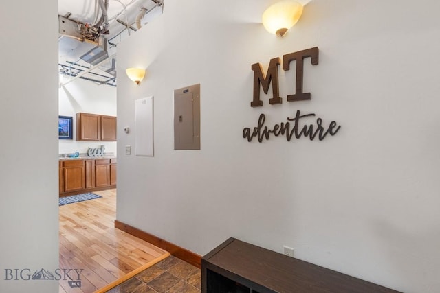 67 Village Dr Unit 4A, Belgrade, MT 59714 - corridor with electric panel, baseboards, and a high ceiling