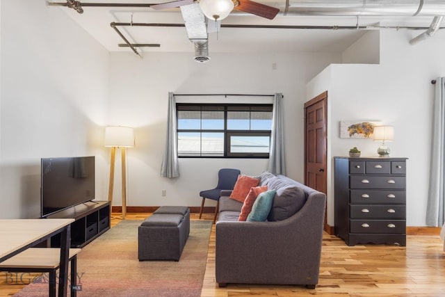 67 Village Dr Unit 4A, Belgrade, MT 59714 - living area featuring light wood finished floors and ceiling fan