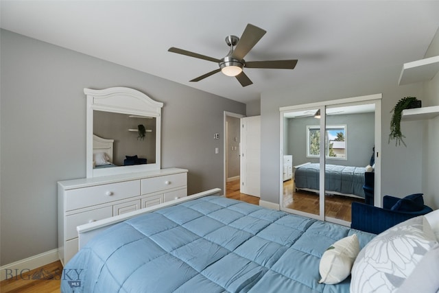 211 N Yellowstone Ave, Bozeman, MT 59718 - bedroom with baseboards, light wood-type flooring, a ceiling fan, and a closet