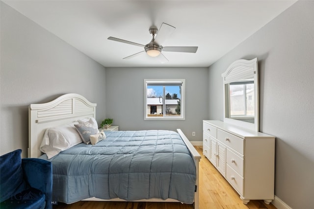 211 N Yellowstone Ave, Bozeman, MT 59718 - bedroom featuring light wood-style flooring, baseboards, and a ceiling fan