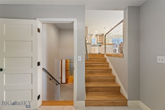 211 N Yellowstone Ave, Bozeman, MT 59718 - staircase featuring baseboards and tile patterned floors