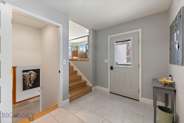 211 N Yellowstone Ave, Bozeman, MT 59718 - foyer featuring stairs, baseboards, and light marble finish floors