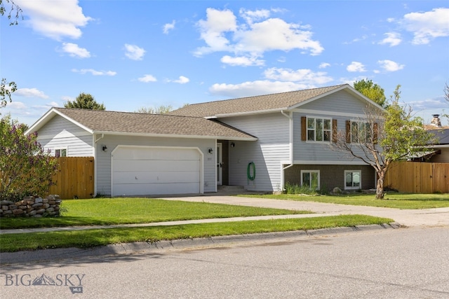 211 N Yellowstone Ave, Bozeman, MT 59718 - view of front facade featuring driveway, a garage, and roof with shingles