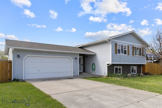 211 N Yellowstone Ave, Bozeman, MT 59718 - split level home with driveway and a garage
