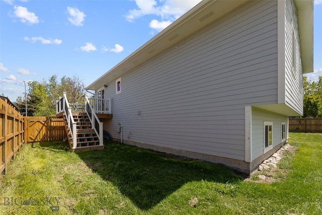 211 N Yellowstone Ave, Bozeman, MT 59718 - view of property exterior featuring a deck and stairway