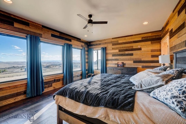 251 Fawn Mdw, Manhattan, MT 59741 - bedroom featuring wood walls, hardwood / wood-style flooring, recessed lighting, and ceiling fan