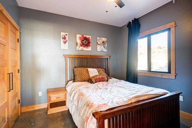 251 Fawn Mdw, Manhattan, MT 59741 - bedroom with baseboards, a ceiling fan, and dark colored carpet