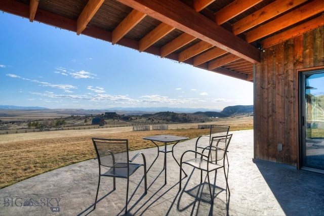 251 Fawn Mdw, Manhattan, MT 59741 - view of patio / terrace featuring a mountain view and a view of rural / pastoral area