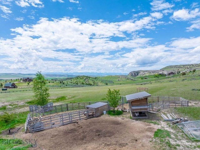 251 Fawn Mdw, Manhattan, MT 59741 - view of yard featuring a rural view, an exterior structure, and an outdoor structure