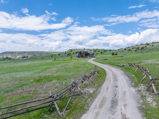 251 Fawn Mdw, Manhattan, MT 59741 - view of dirt / gravel road featuring a view of rural / pastoral area
