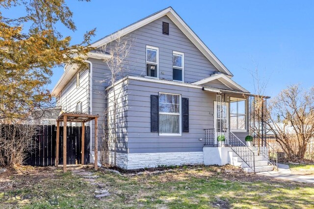 view of front of property with fence