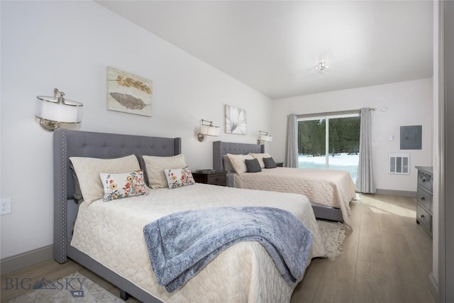 57 Vagabond Ln, Anaconda, MT 59711 - bedroom with access to outside, wood finished floors, baseboards, and visible vents