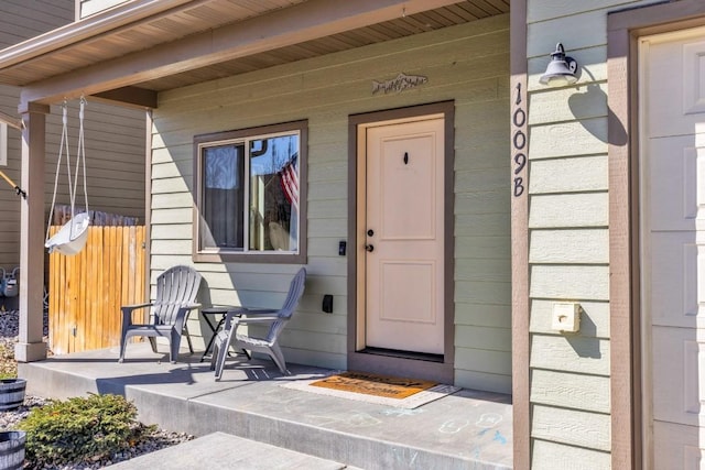 1009 Idaho Unit B, Belgrade, MT 59714 - view of exterior entry featuring covered porch