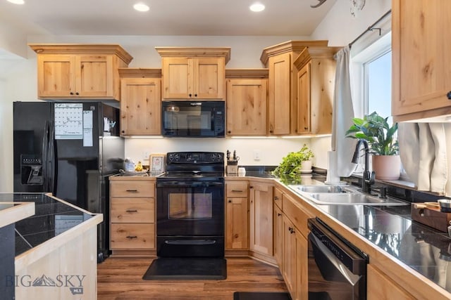 1009 Idaho Unit B, Belgrade, MT 59714 - kitchen with light brown cabinets, recessed lighting, a sink, dark wood-type flooring, and black appliances
