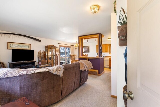 490 Secretariat Cir, Belgrade, MT 59714 - living room featuring light colored carpet