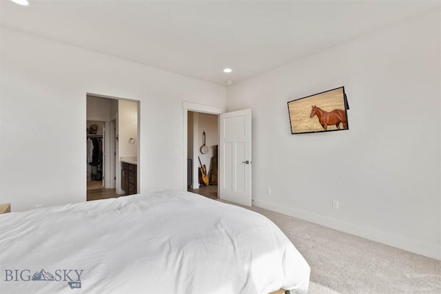 1510 Deadwood Loop, Belgrade, MT 59714 - bedroom with carpet flooring, recessed lighting, and a walk in closet