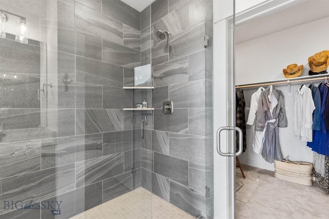 1510 Deadwood Loop, Belgrade, MT 59714 - bathroom with a stall shower and a walk in closet