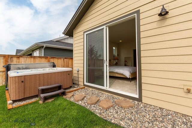 1510 Deadwood Loop, Belgrade, MT 59714 - view of patio / terrace with a hot tub
