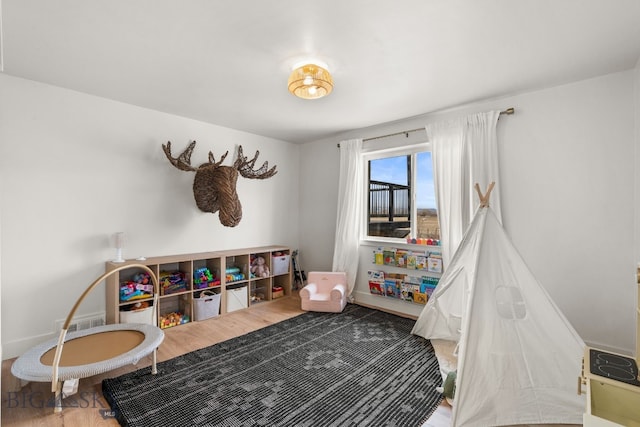 rec room with baseboards