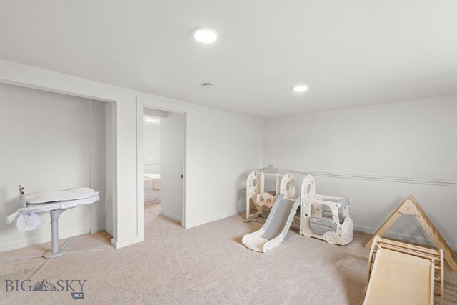 recreation room featuring baseboards, carpet, and recessed lighting
