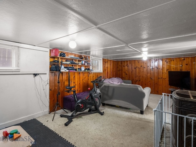 220 4th Ave E, Three Forks, MT 59752 - bedroom with wood walls, carpet, and baseboards