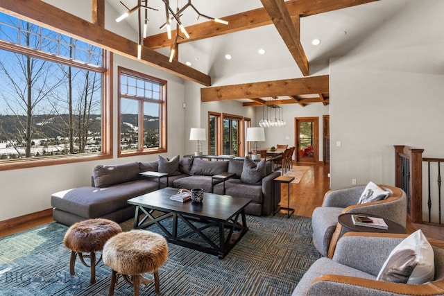 2430 Two Gun White Calf Rd, Big Sky, MT 59716 - living room with beam ceiling, recessed lighting, high vaulted ceiling, a chandelier, and dark wood-style floors