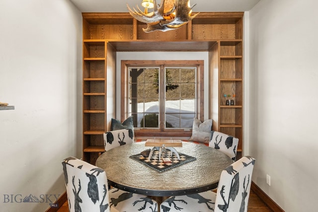 2430 Two Gun White Calf Rd, Big Sky, MT 59716 - dining room with wood finished floors