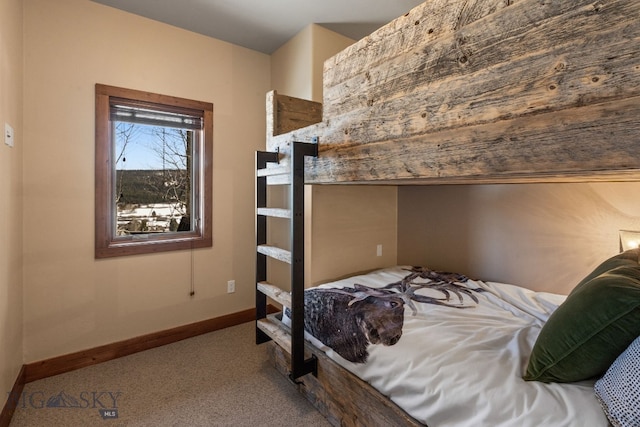 2430 Two Gun White Calf Rd, Big Sky, MT 59716 - carpeted bedroom featuring baseboards