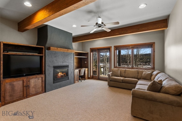 2430 Two Gun White Calf Rd, Big Sky, MT 59716 - carpeted living area with beam ceiling, a glass covered fireplace, recessed lighting, and a ceiling fan