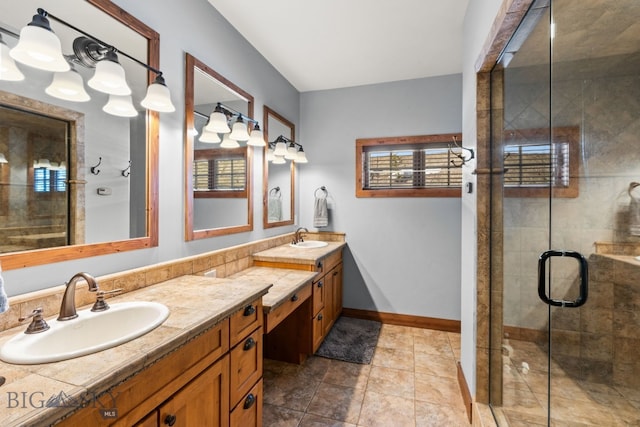 2430 Two Gun White Calf Rd, Big Sky, MT 59716 - bathroom with double vanity, a shower stall, and baseboards