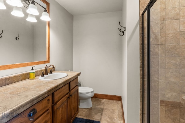 2430 Two Gun White Calf Rd, Big Sky, MT 59716 - full bath featuring toilet, vanity, a stall shower, and baseboards