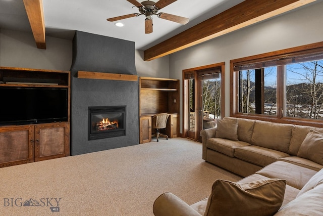 2430 Two Gun White Calf Rd, Big Sky, MT 59716 - carpeted living area with beamed ceiling, recessed lighting, a large fireplace, healthy amount of natural light, and ceiling fan