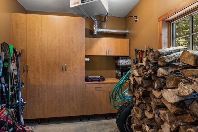 2430 Two Gun White Calf Rd, Big Sky, MT 59716 - garage with a heating unit