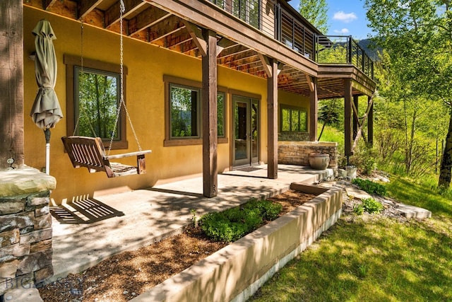 2430 Two Gun White Calf Rd, Big Sky, MT 59716 - view of patio / terrace featuring a wooden deck