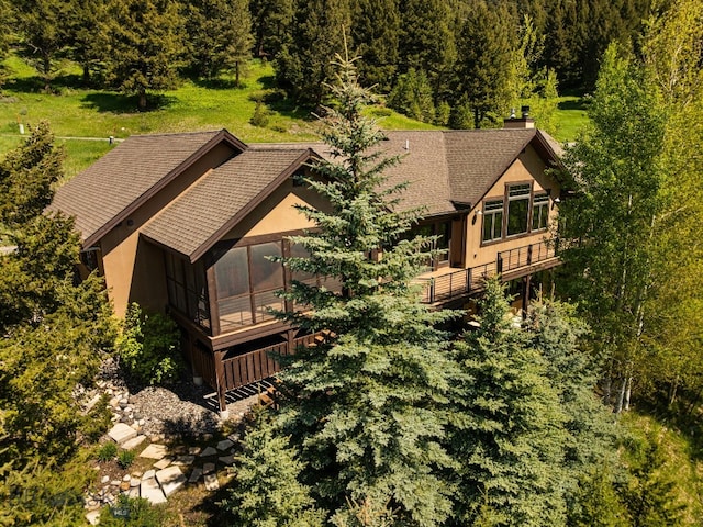 2430 Two Gun White Calf Rd, Big Sky, MT 59716 - view of subject property with a heavily wooded area