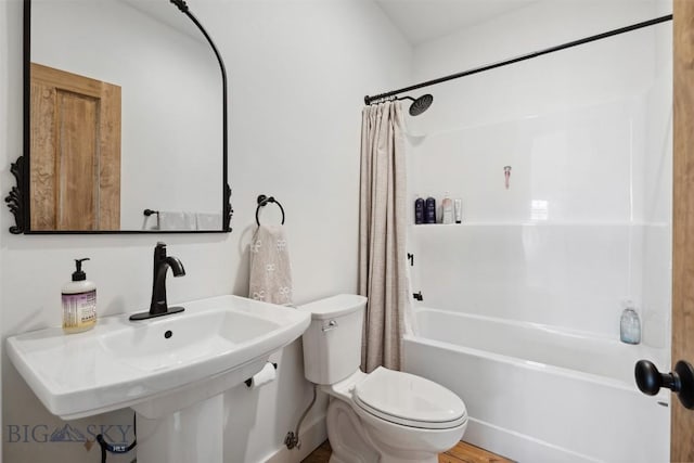 992 Deer Haven Dr, Deer Lodge, MT 59722 - full bathroom featuring toilet, shower / bath combo, and a sink