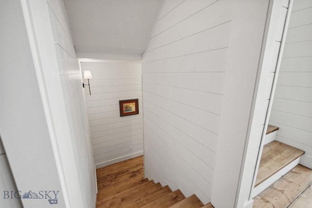 992 Deer Haven Dr, Deer Lodge, MT 59722 - staircase with wood finished floors, lofted ceiling, and wood walls