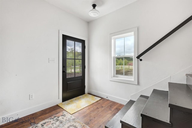 992 Deer Haven Dr, Deer Lodge, MT 59722 - entryway with stairs, wood finished floors, and baseboards
